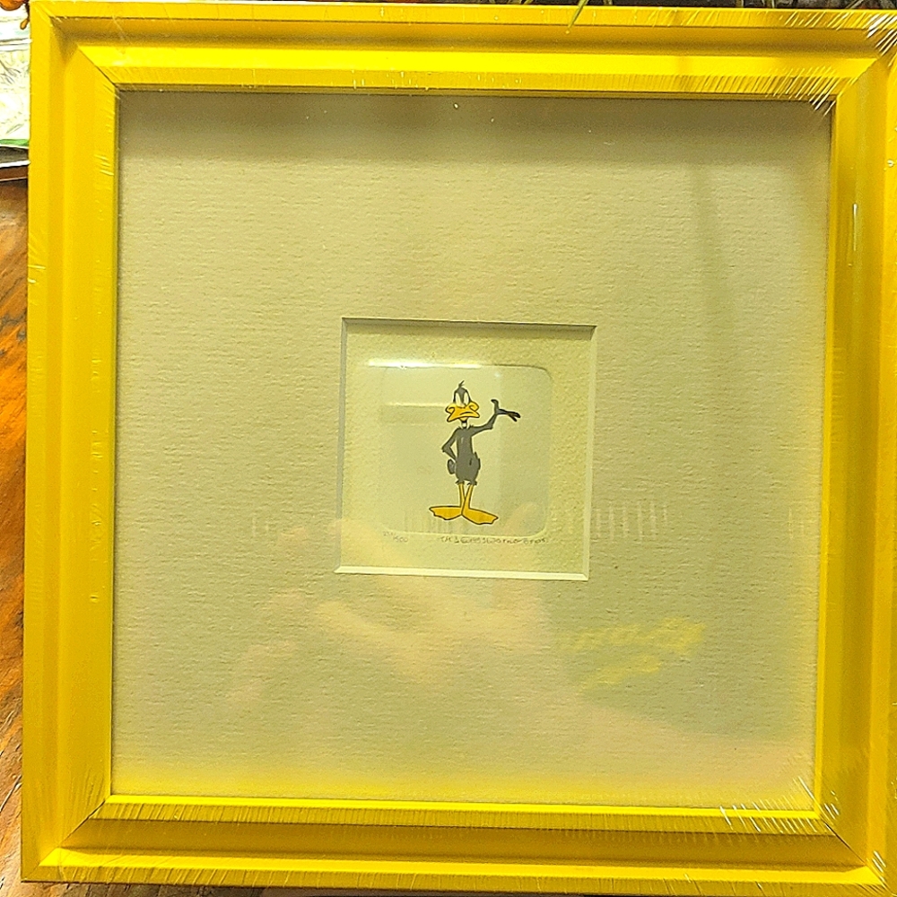 Warner Bros. Daffy Duck Yellow Framed Art